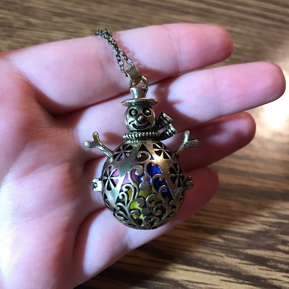 Bronze snowman essential oil necklace